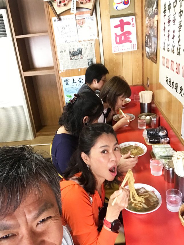 Eating ramen noodles in a Tokyo noodle bar