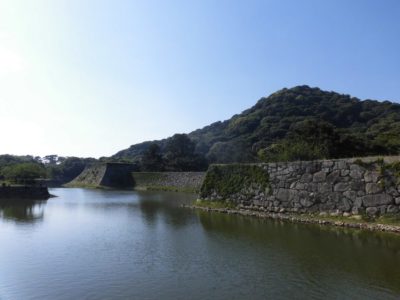 Lake and castle wall at Shizuki Park, Hagi, Japan