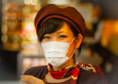 japan mask | Japan City Tour | Travel agency in Tokyo Japanese woman wearing a surgical mask in Japan